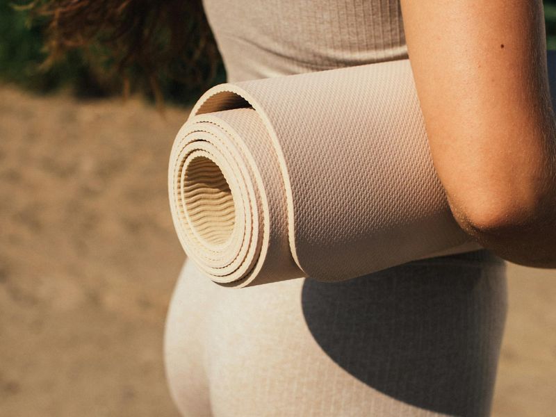Detailed close-up of yoga mat and sport accessories