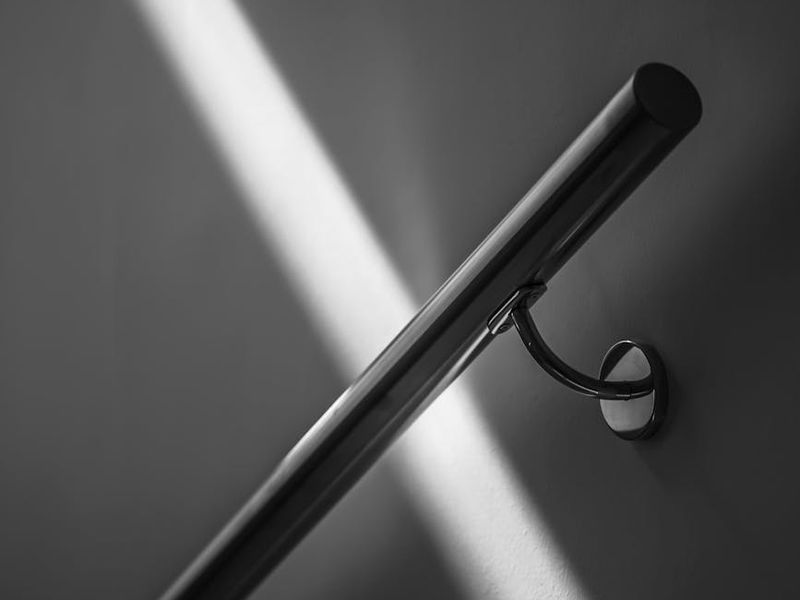 Minimalist home gym with natural light and white walls